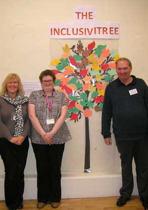 Inclusive tree - three people posing